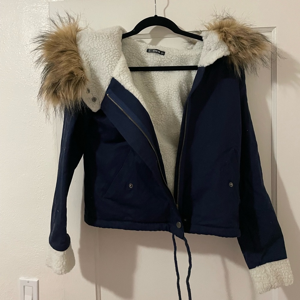 Blue waist length coat